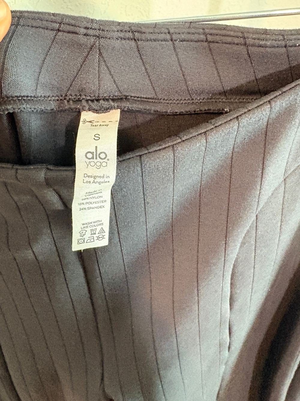Alo Yoga Ribbed High-Waist Flare  in Deep Charcoal Pants